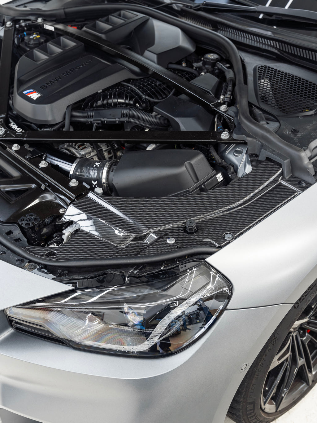 BMW M2 G87 Pre-Preg Carbon Fibre Engine Bay Headlight Cover by FORM (2023+)