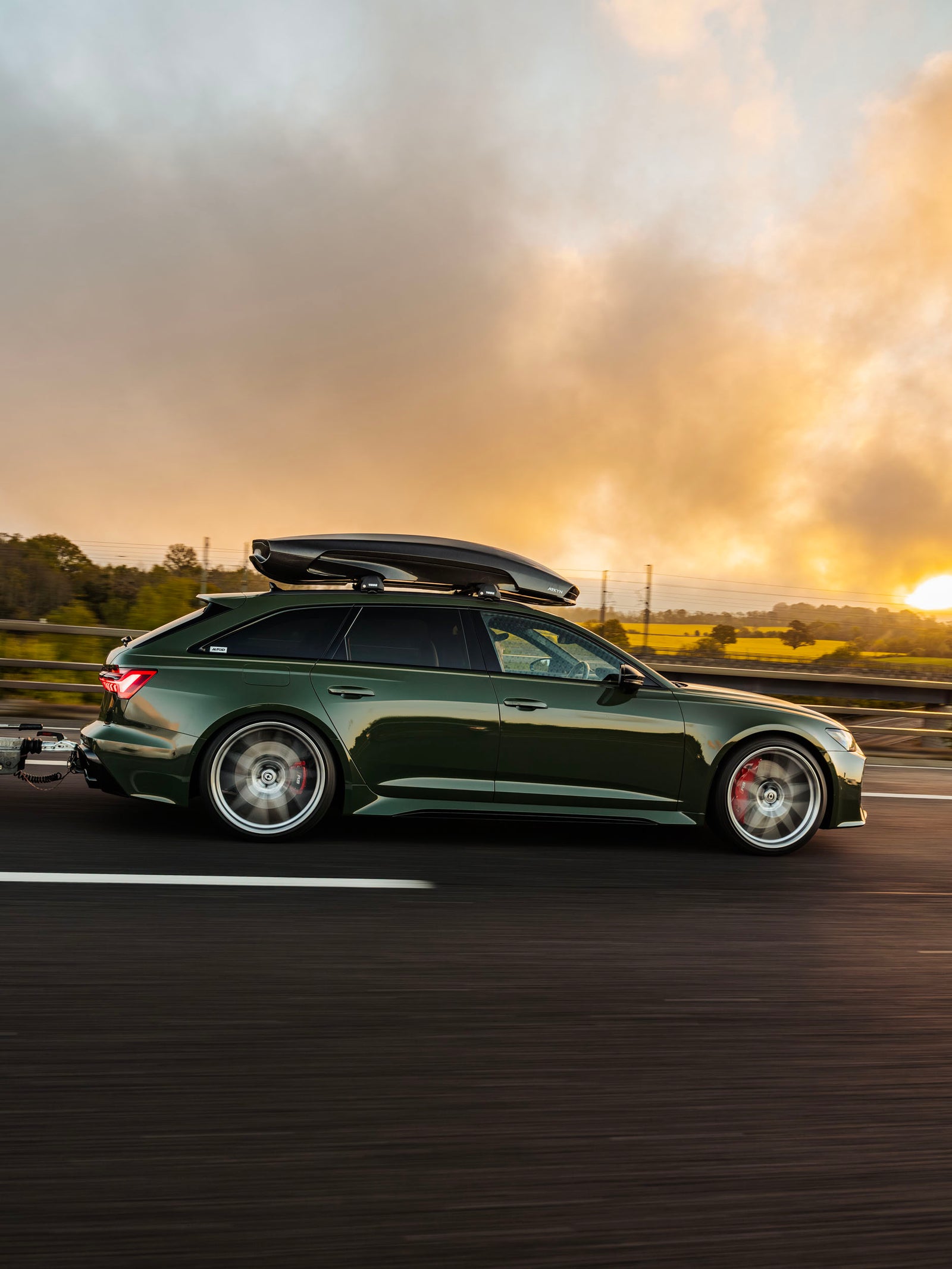 Modified AUDI C8 RS6 towing on motorway