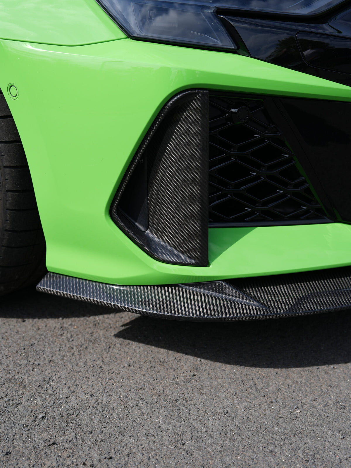 Audi RS3 8Y LCI Carbon Front Splitter — low angle installed view