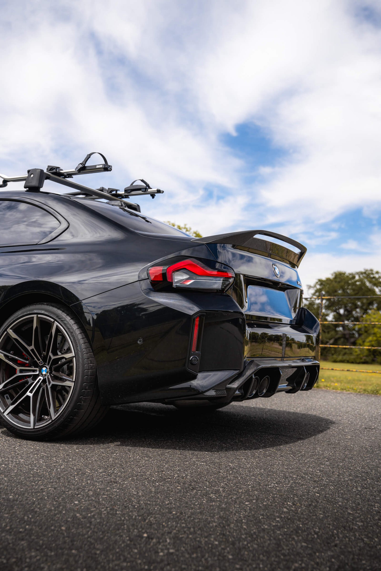 Rear of BMW G87 M2 with ADRO carbon rear diffuser and rear spoiler boot lip