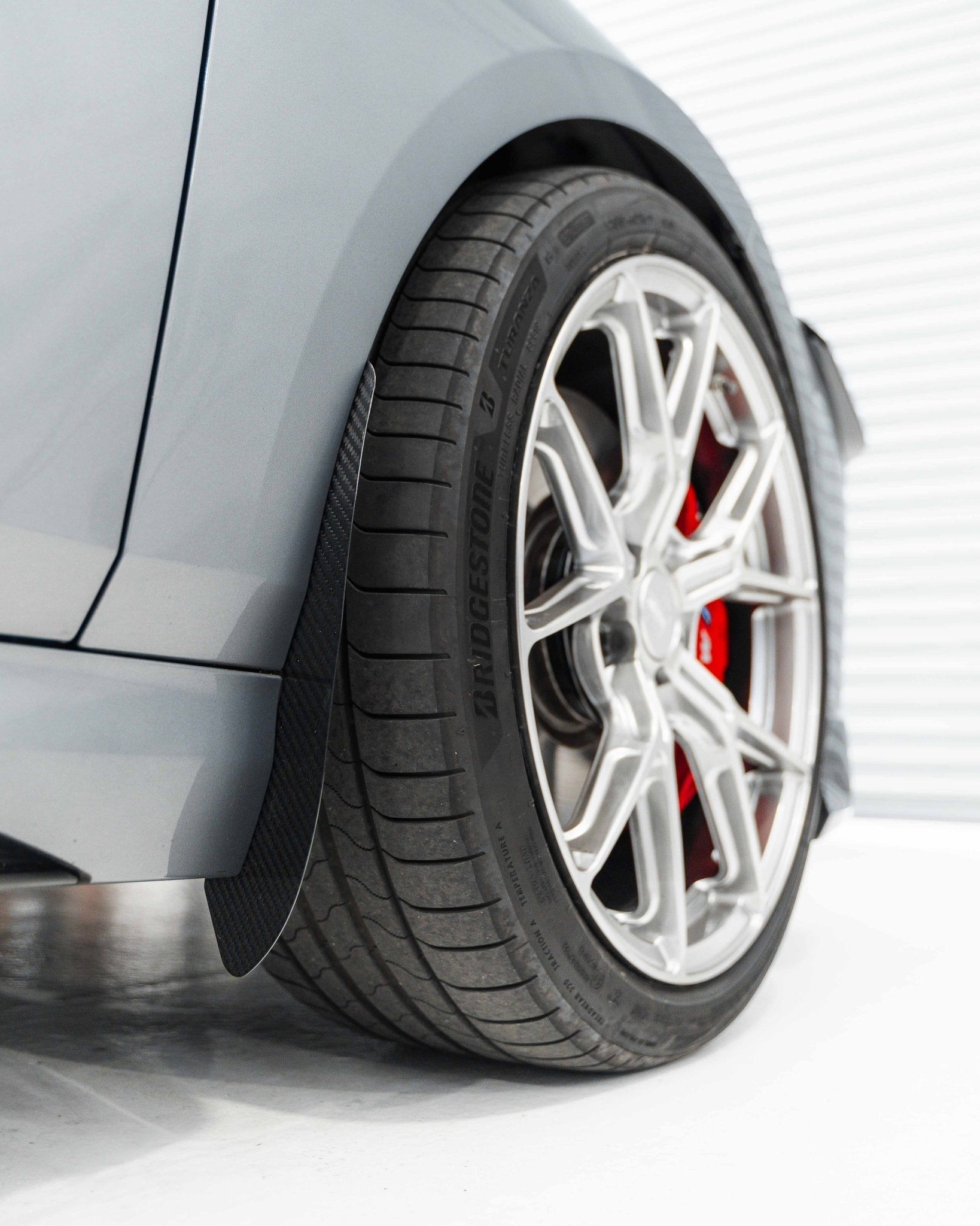 BMW 1 Series & M135 F70 Carbon Fibre Arch Guards by AP (2024+) - AUTOID® - Arch Guards & Flaps - Automotive Passion