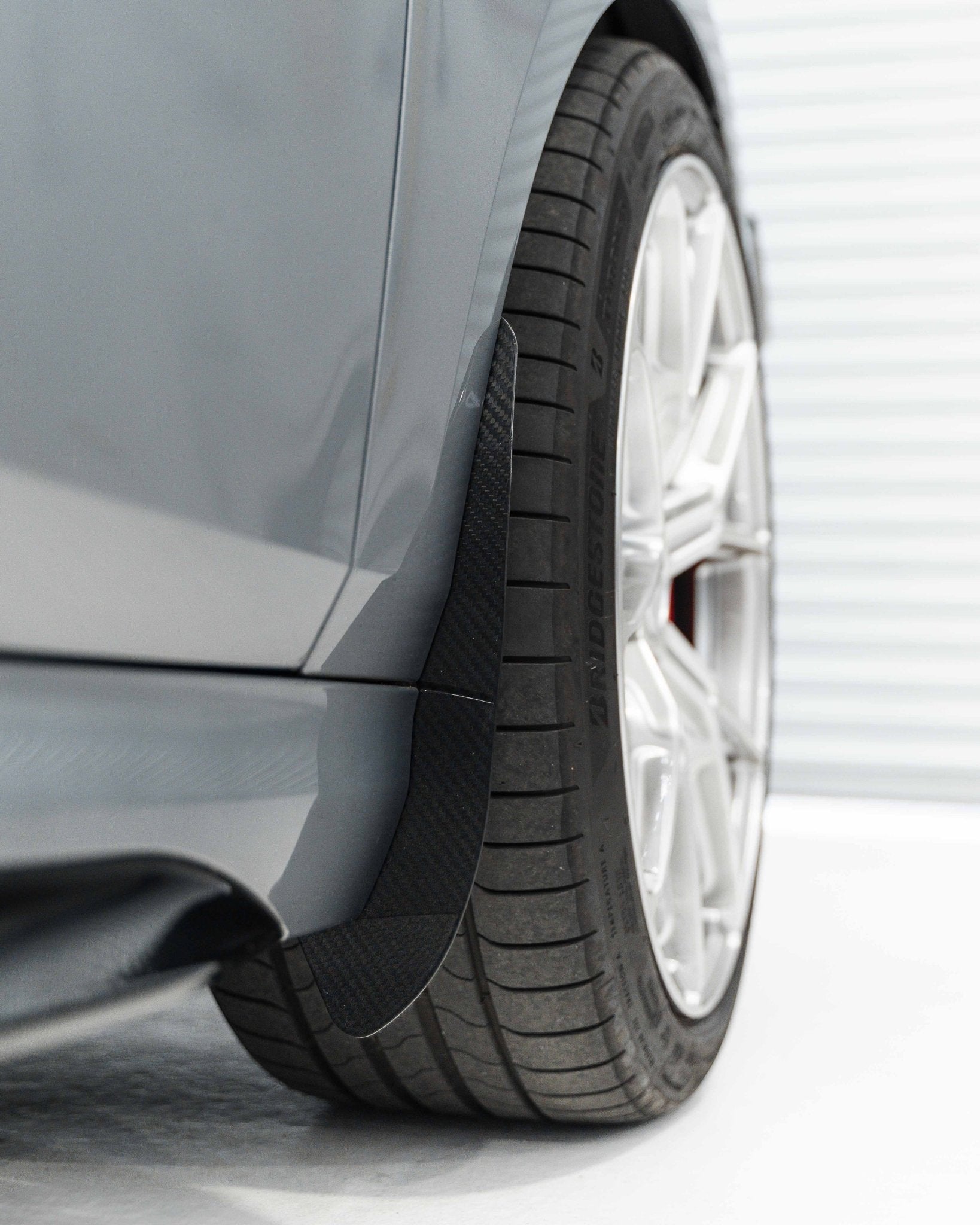 BMW 1 Series & M135 F70 Carbon Fibre Arch Guards by AP (2024+) - AUTOID® - Arch Guards & Flaps - Automotive Passion