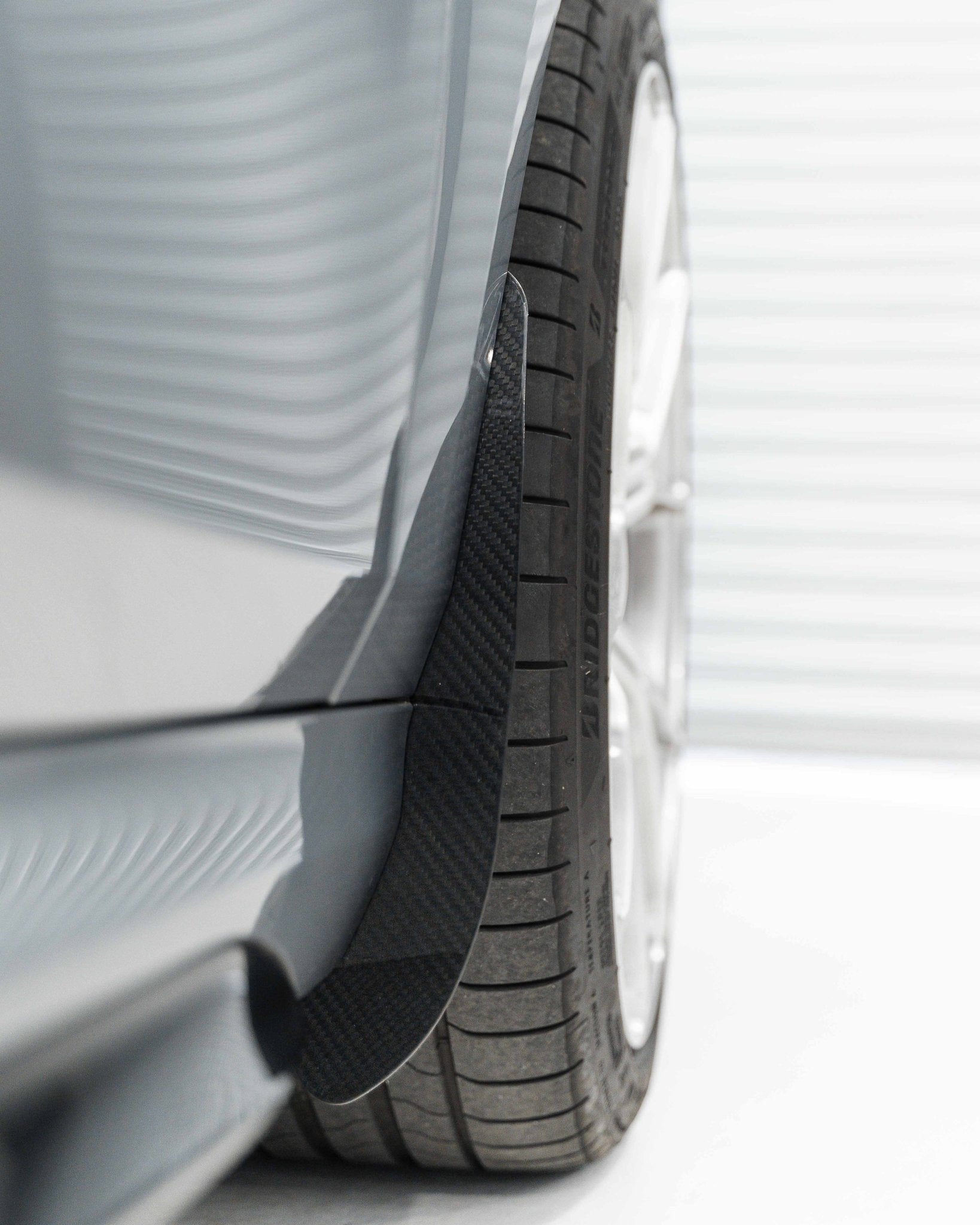 BMW 1 Series & M135 F70 Carbon Fibre Arch Guards by AP (2024+) - AUTOID® - Arch Guards & Flaps - Automotive Passion