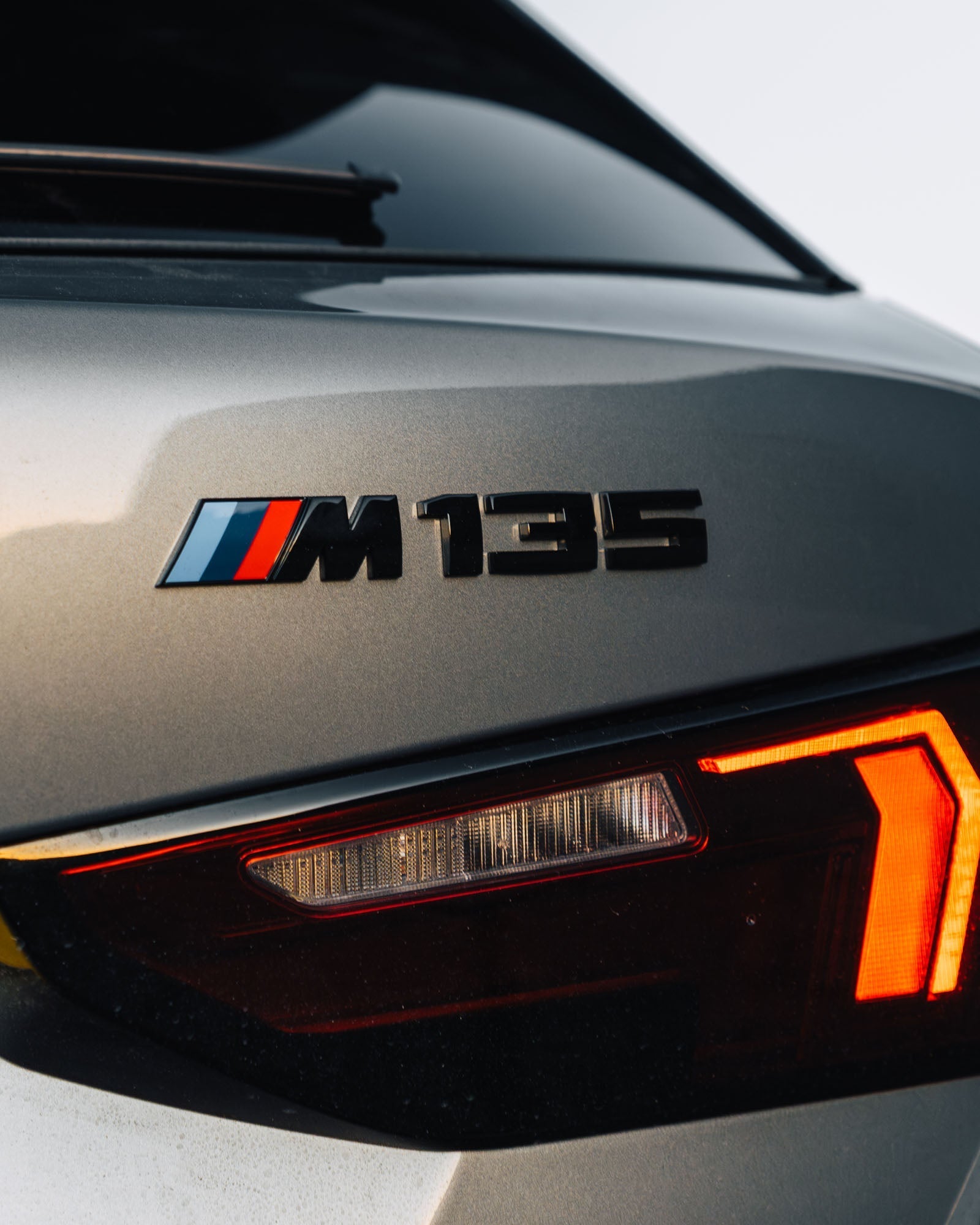 BMW M135i Genuine M Performance Black High Gloss Model Badge - AUTOID® - Model Badges - BMW M Performance