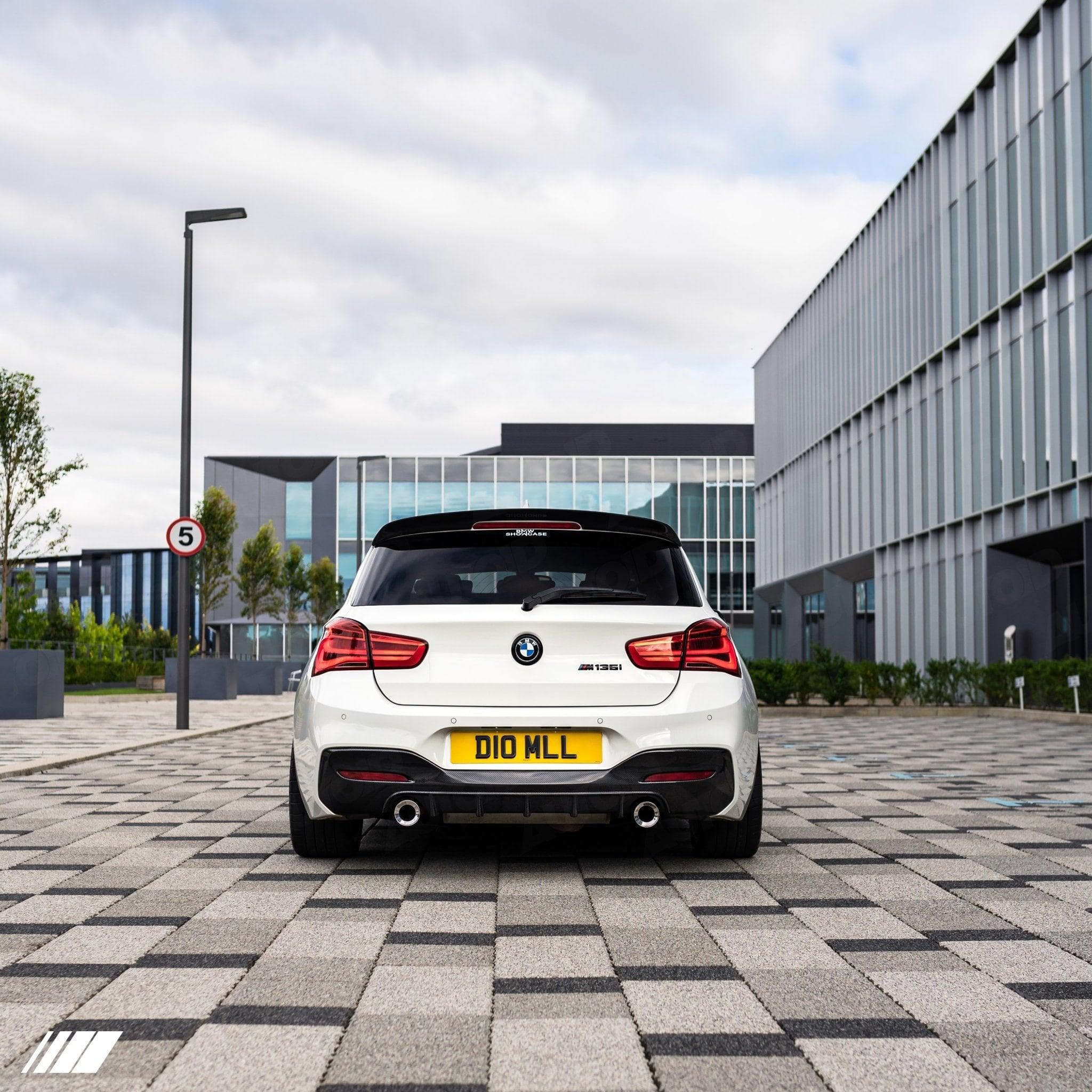 BMW F20 F21 M140i and M135i LCI carbon fibre performance rear diffuser fitted rear three-quarter view