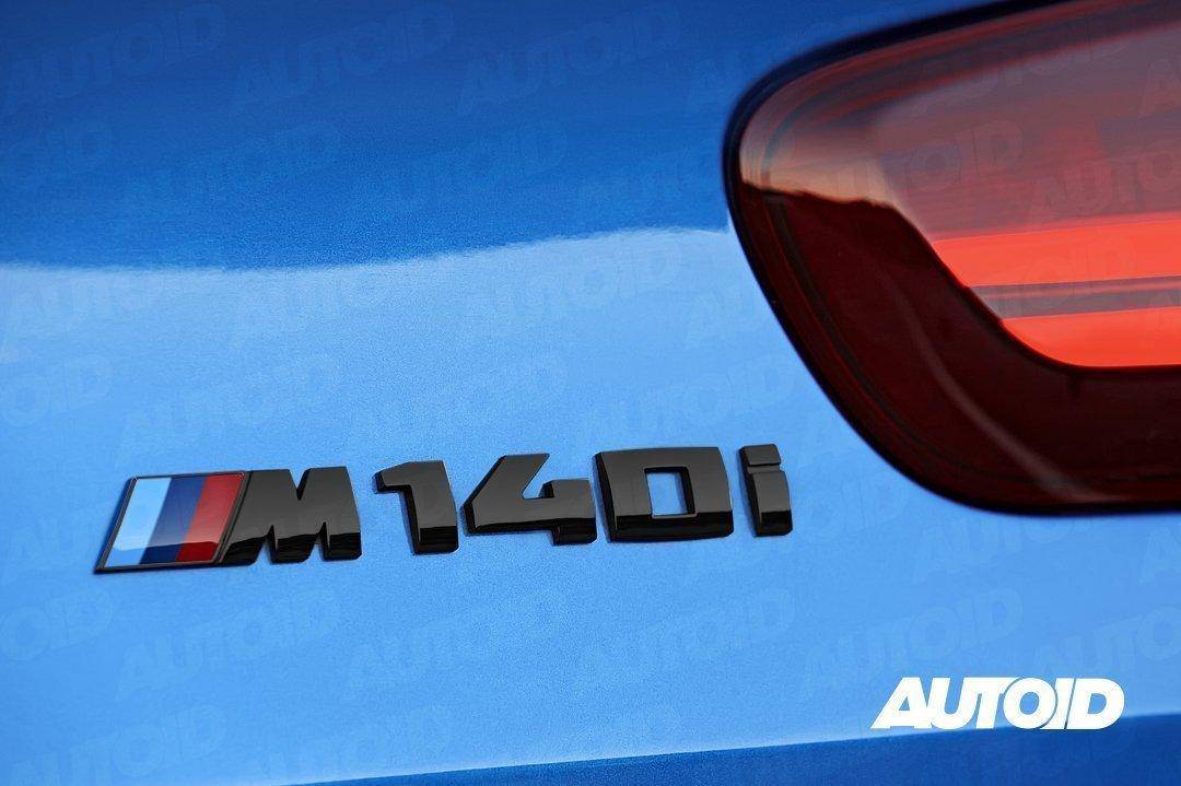 Gloss Black Rear Model Badge for BMW 1 Series M140i (F20 F21), Model Badges, Essentials - AUTOID | Premium Automotive Accessories