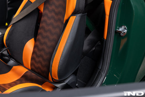 BMW G8X M Carbon Bucket Seat with Wunderworks Upper Bolster Protector Set installed